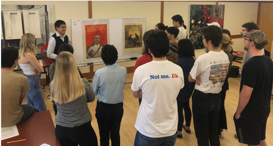 Students in HIST 352 view Cultural Revolution propaganda posters with images of Norman Bethune